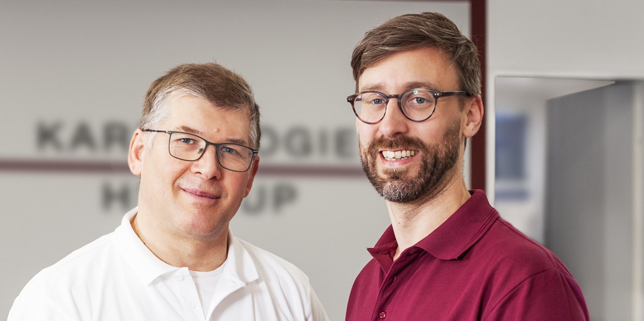 Dr. Maximilian Kallenbach und Dr. Andrey Rozhnev, Fachärzte für Kardiologie in Münster.